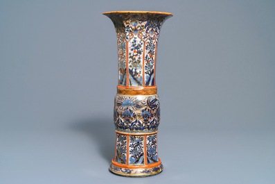 A Chinese blue and white vase with European clobbered decoration, Kangxi