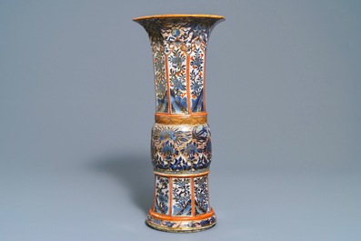 A Chinese blue and white vase with European clobbered decoration, Kangxi