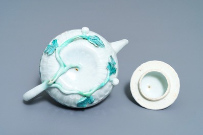 A Chinese famille rose helmet-shaped jug and a relief-decorated teapot, Yongzheng