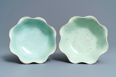 A pair of Chinese famille rose jardini&egrave;res and two celadon bowls, 19th C.