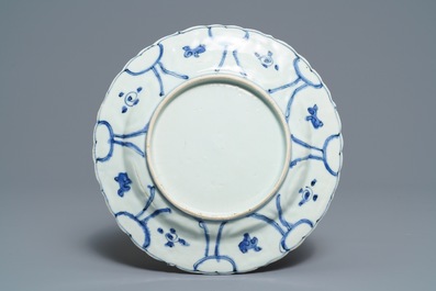 A Chinese blue and white bowl and a kraak porcelain 'deer' plate, Wanli