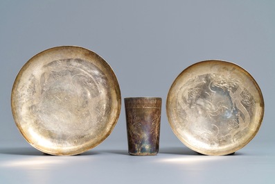 A pair of Chinese cloisonn&eacute; bottle vases, two silver saucers and a silver cup, 19/20th C.