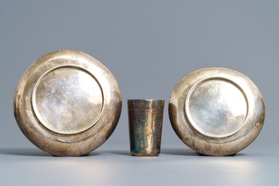 A pair of Chinese cloisonn&eacute; bottle vases, two silver saucers and a silver cup, 19/20th C.