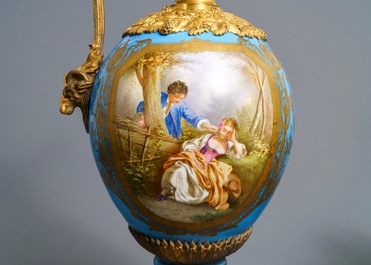 A pair of massive gilt bronze-mounted S&egrave;vres porcelain ewers and a jardini&egrave;re, France, 19th C.