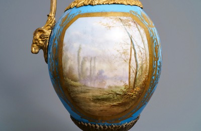 A pair of massive gilt bronze-mounted S&egrave;vres porcelain ewers and a jardini&egrave;re, France, 19th C.