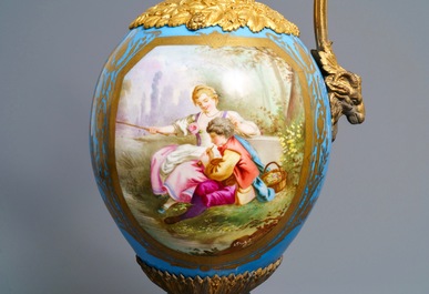 A pair of massive gilt bronze-mounted S&egrave;vres porcelain ewers and a jardini&egrave;re, France, 19th C.