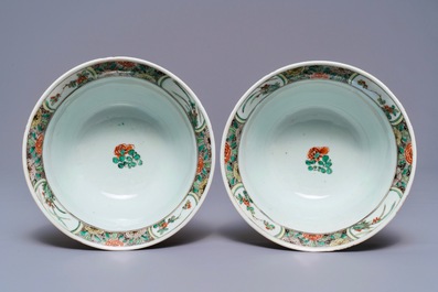 A pair of Chinese famille verte 'peacock among blossoms' bowls, Kangxi