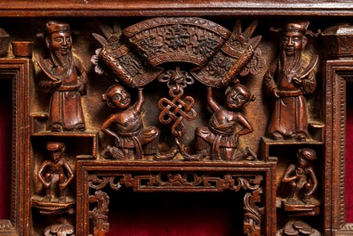 Two Chinese carved wood frames with dragons and figures, ca. 1900