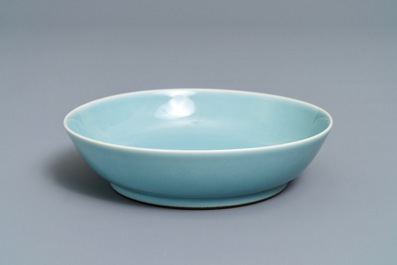 A Chinese monochrome clair-de-lune-glazed saucer dish, Qianlong mark, 19/20th C.