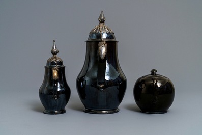Two silver-mounted Namur black-glazed pottery jugs and a teapot, 18th C.
