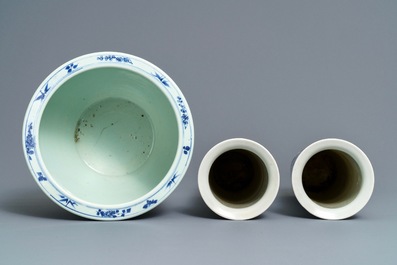 Four Chinese blue and white vases and a jardini&egrave;re, 19th C.