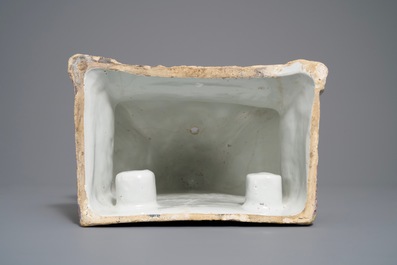 A large petit feu and gilded Dutch Delft wall cistern, 18th C.