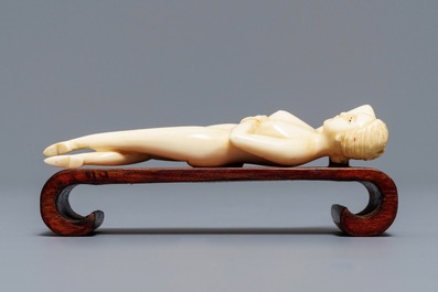A Chinese ivory model of a doctor's lady, 19th C.