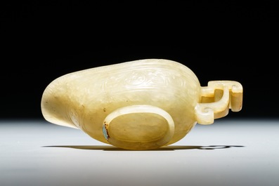 A Chinese pale yellow jade libation cup, 19th C.