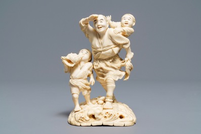 A signed Japanese ivory okimono, Meiji, 19th C.