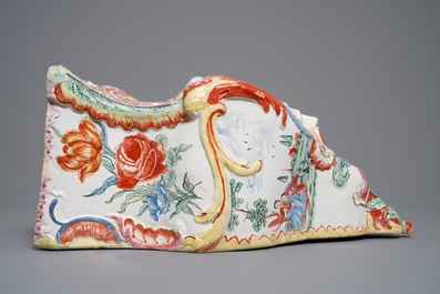 A large petit feu and gilded Dutch Delft wall cistern, 18th C.
