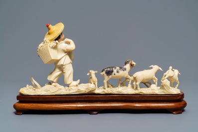 A polychrome Chinese ivory group with a shepherd, ca. 1940