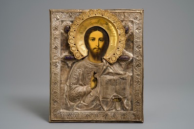 Two Russian silvered copper oklad or riza icons: 'Mother of God with apostles' and 'Pantocrator', 19th C.