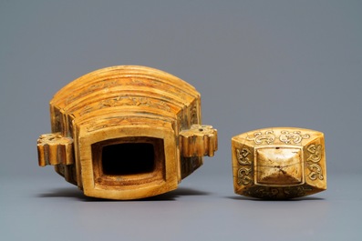 A Chinese archaistic ivory vase and cover on wooden stand, ca. 1900