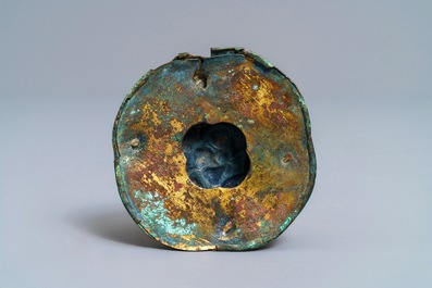 Two Chinese inlaid bronze belt hooks and a bronze ornament, Zhou or Han