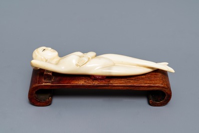 A Chinese ivory model of a doctor's lady, 19th C.