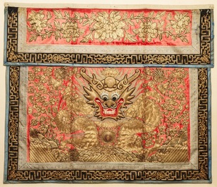 A pair of large Chinese relief-embroidered silk 'dragon' panels, 19th C.