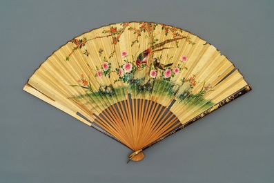 Five Chinese painted paper, wood and lacquer fans, Canton, 19th C.