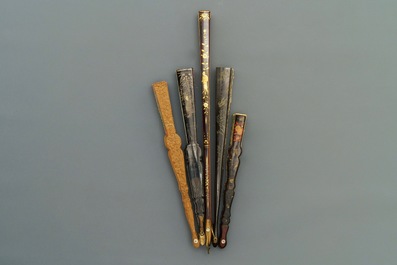 Five Chinese painted paper, wood and lacquer fans, Canton, 19th C.