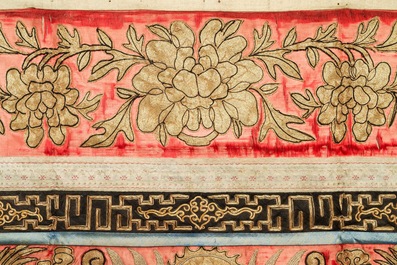 A pair of large Chinese relief-embroidered silk 'dragon' panels, 19th C.