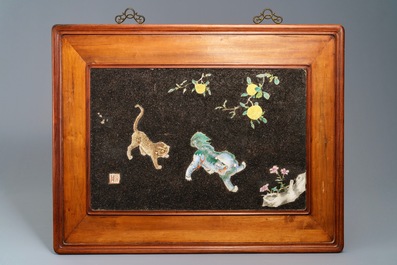 Four Chinese famille rose black gravel-embellished plaques, Qianlong