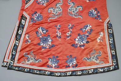 A Chinese woman's embroidered red silk side-opening informal coat, 19th C.