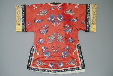 A Chinese woman's embroidered red silk side-opening informal coat, 19th C.