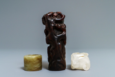 A Chinese jade archer's ring, a horn libation cup and a Beijing glass brush washer, 18th C. and later