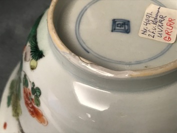 A pair of Chinese famille verte 'peacock among blossoms' bowls, Kangxi