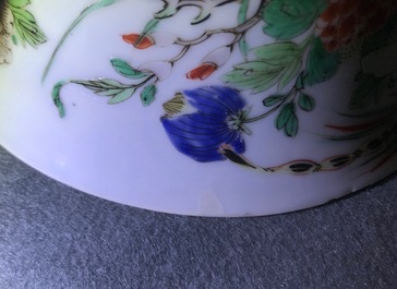 A pair of Chinese famille verte 'peacock among blossoms' bowls, Kangxi