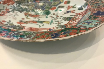 A fine Chinese famille verte dish with ladies in a garden, Kangxi