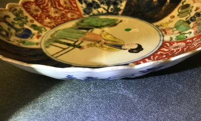 A Chinese verte-Imari 'lady and squirrel' plate, Kangxi
