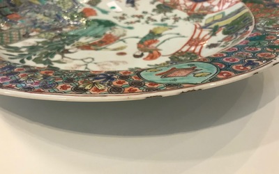 A fine Chinese famille verte dish with ladies in a garden, Kangxi