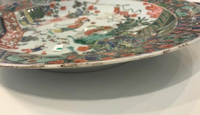 A fine Chinese famille verte dish with ladies in a garden, Kangxi
