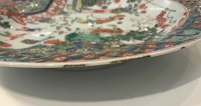 A fine Chinese famille verte dish with ladies in a garden, Kangxi