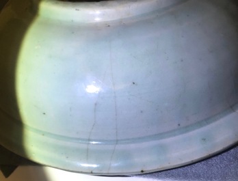 A Chinese Longquan celadon dish with underglaze design of peonies, Ming