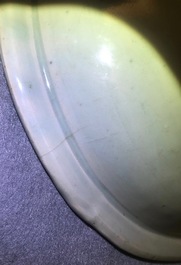 A Chinese Longquan celadon dish with underglaze design of peonies, Ming