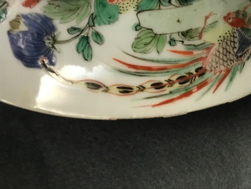 A pair of Chinese famille verte 'peacock among blossoms' bowls, Kangxi
