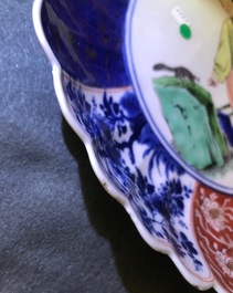 A Chinese verte-Imari 'lady and squirrel' plate, Kangxi
