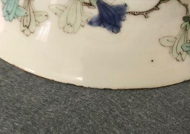 A pair of Chinese famille verte 'peacock among blossoms' bowls, Kangxi