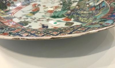 A fine Chinese famille verte dish with ladies in a garden, Kangxi