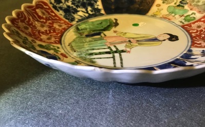 A Chinese verte-Imari 'lady and squirrel' plate, Kangxi