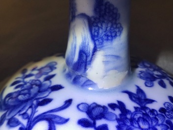 A pair of Chinese blue and white candlesticks, Kangxi/Qianlong