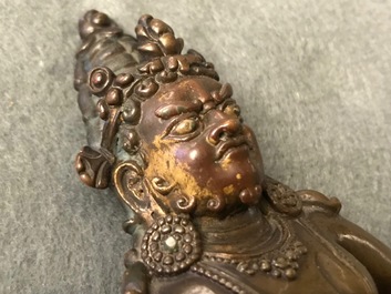 A Sino-Tibetan bronze figure of Jambhala, 17/18th C.