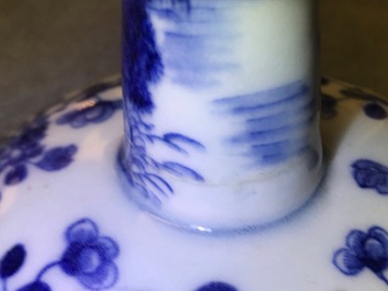 A pair of Chinese blue and white candlesticks, Kangxi/Qianlong